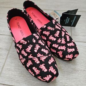 NIB TOMS Women's Pink Dinosaur Alpargata Shoes Glow in the Dark Neon T-Rex Sz 6